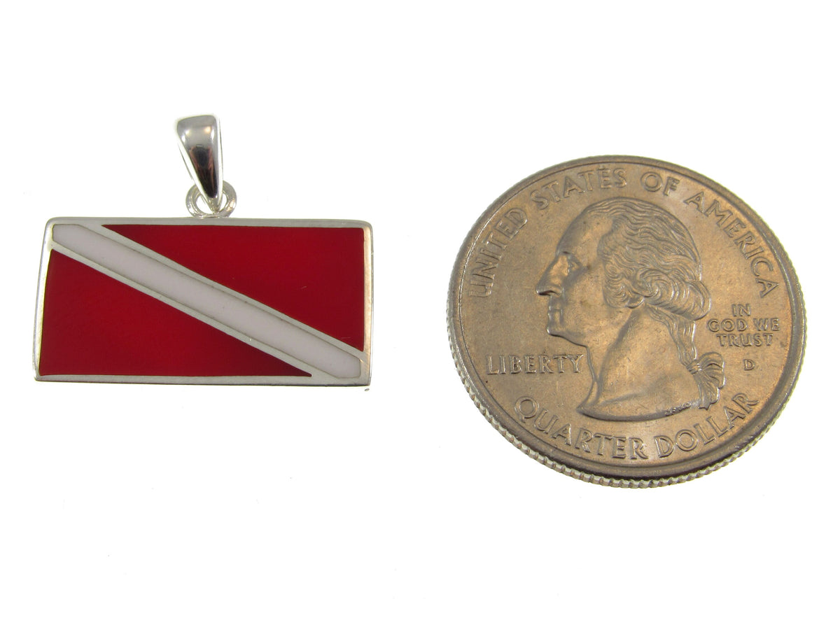 The rectangular diver down scuba diver flag pendant is a bit smaller than the size of a US quarter.