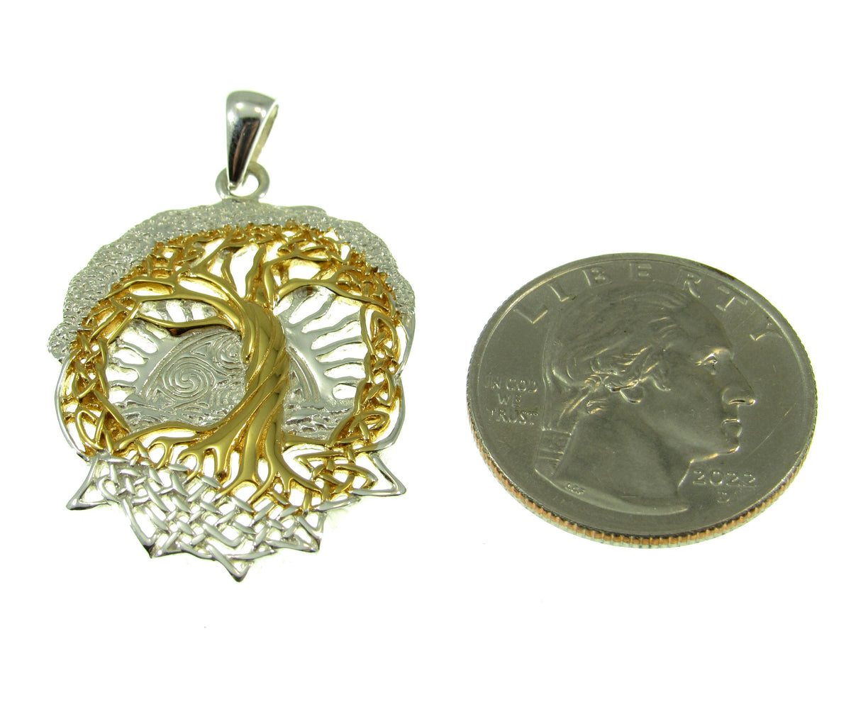 Larger than a US quarter, the solid sterling silver and gold vermeil tree of life pendant measures 1 5/8 inches long by 1 inch wide.