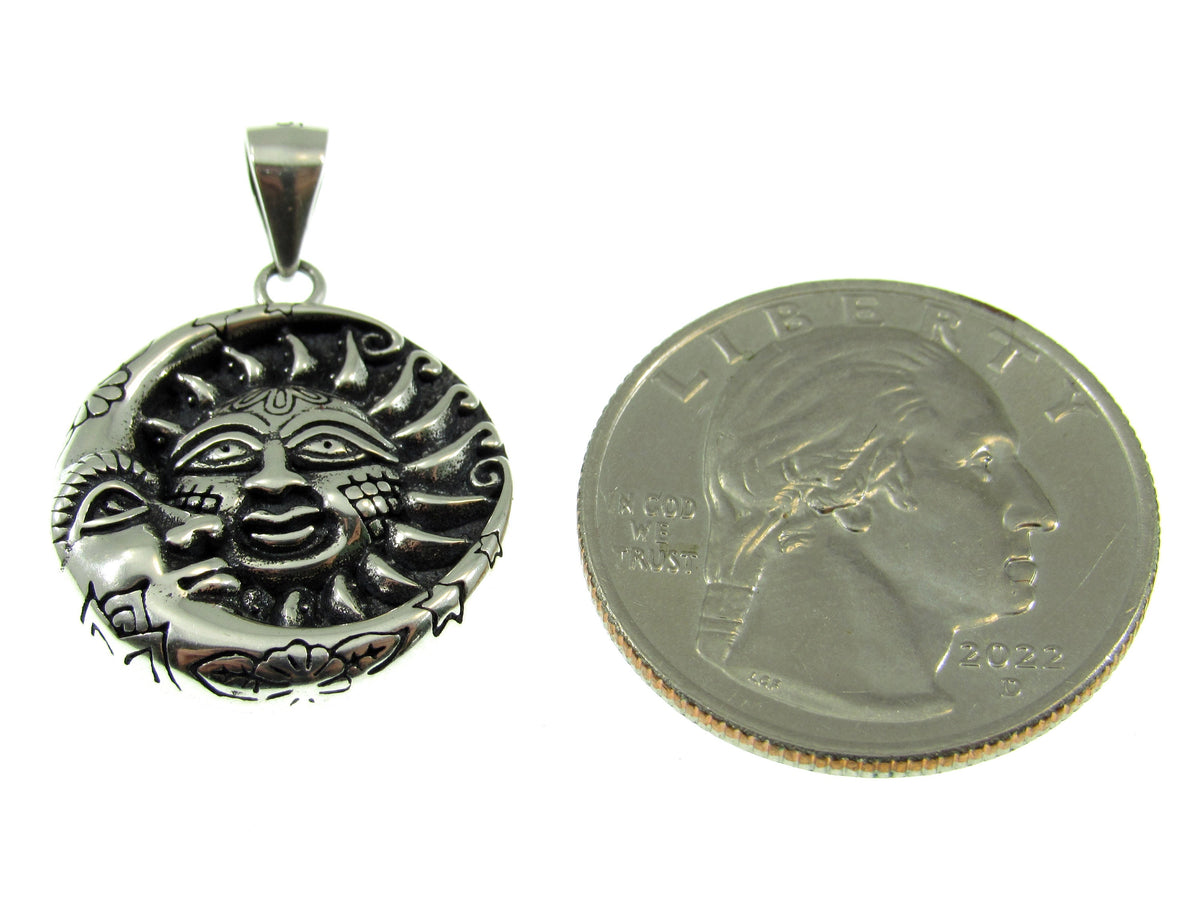 A bit smaller than a US quarter, the crescent moon and sun cuddle faces pendant is the perfect charm for everyday wear.