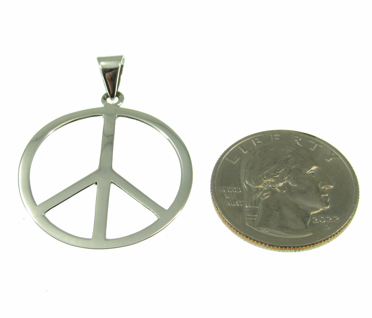 A bit larger than a US quarter, the sterling silver peace sign pendant measures 1 1/2 inches long by 1 1/8 inches wide.